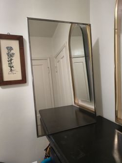 Bathroom Cabinet Wall Mount Mirrored storage with door.