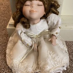 Musical Porcelain Doll