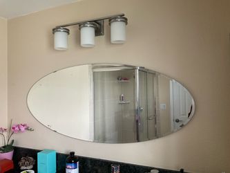 Large Frameless Oval Bathroom Mirror with Modern 3-Light Vanity Fixture