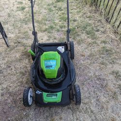 2 Greenworks mowers