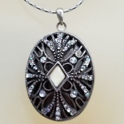QUINTESSENTIAL MARCASITE LOCKET 