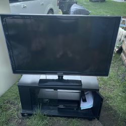 Samsung TV, Stand And VHS Player With Remote