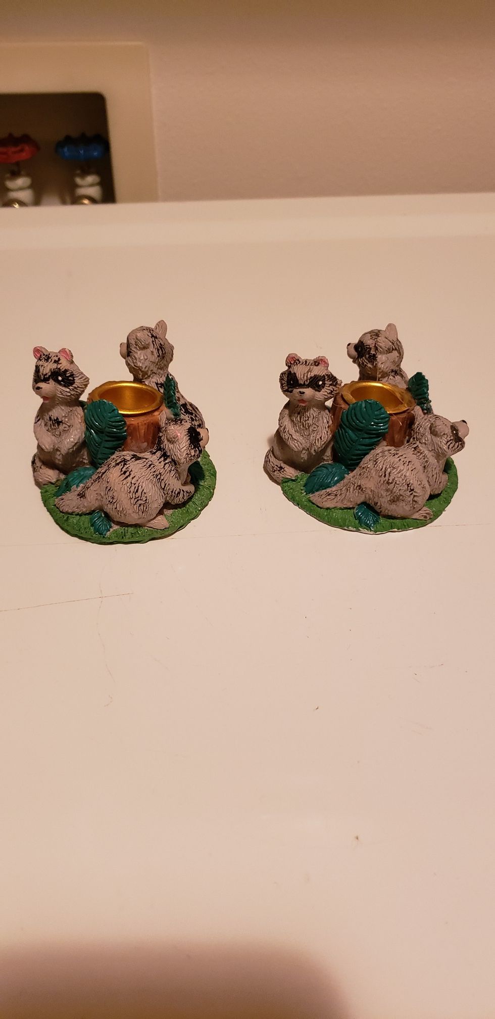 Pair of Raccoon Tapered Candlestick holders. NEW.