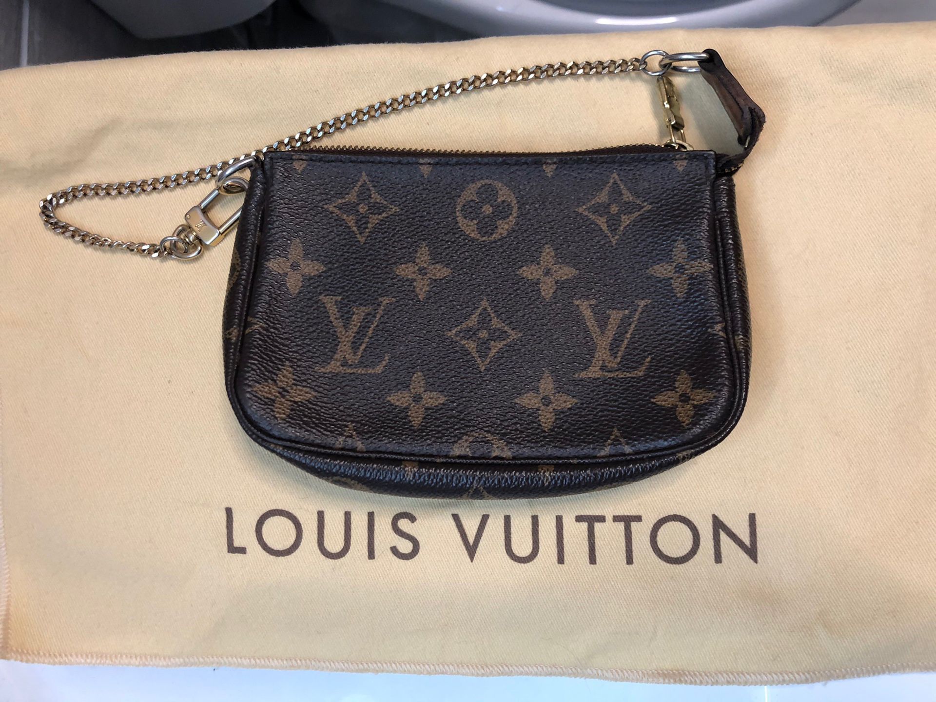 Louis Vuitton Mini Pochette Monogram Bag - Farfetch