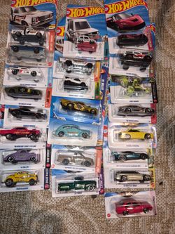 24 mainline hotwheels and 1 treasure hunt
