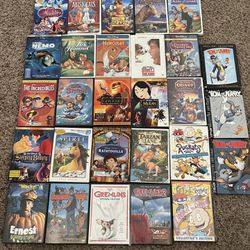 28 Kids DVDs - Disney, Rugrats, Tom And Jerry