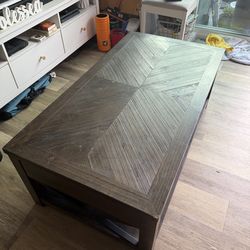 Coffee table with lift top
