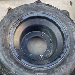Rear ITP Rim And Sand paddle Tire