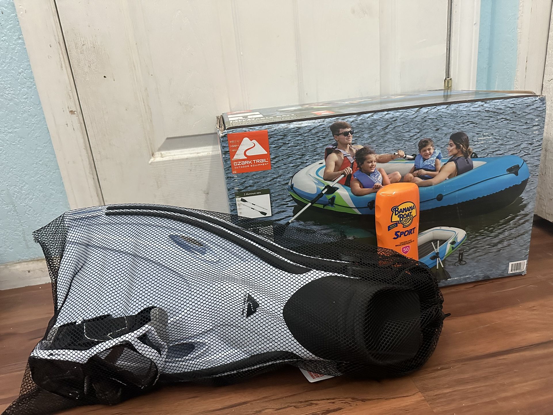 Inflatable Raft + Sunscreen + Scuba Gear