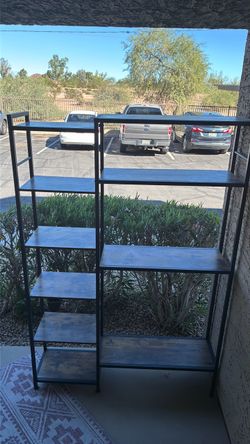 70in H x  47.5 in W x  11 in D wood and metal bookcase