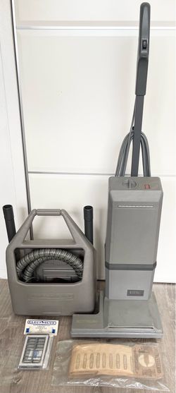 Electrolux Vacuum with hose, brush, filters, and bags