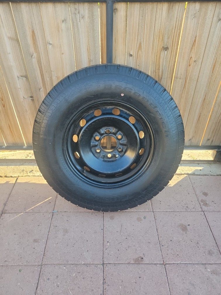 6 LUG 6X135 STEELIE RIM /SPARE 17" . TIRE IS JUST A ROLLER (245/75/17)