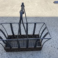 $5 Metal and wicker basket magazine rack