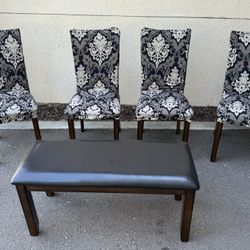 Chairs And Bench With Covers