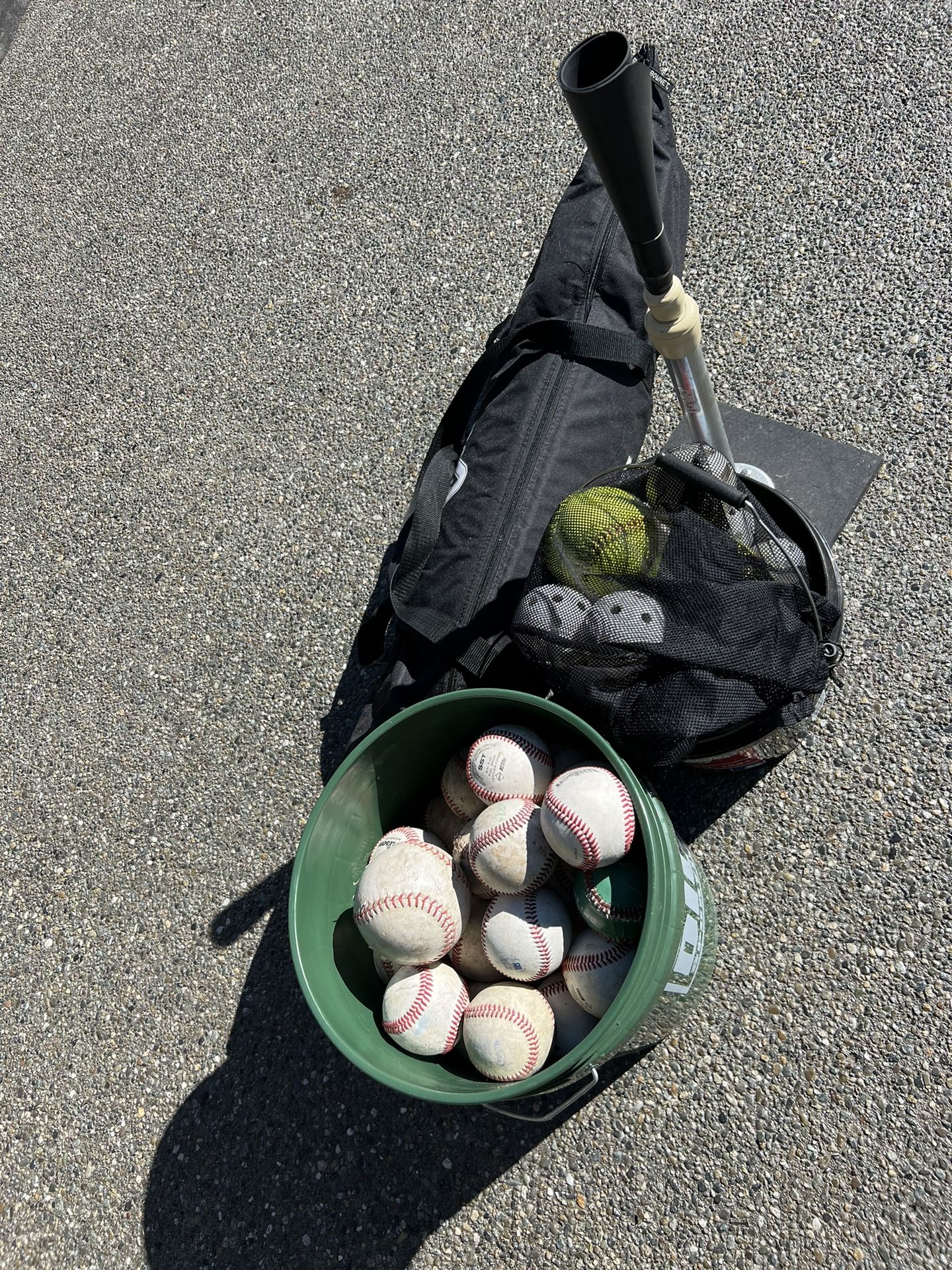 Bownet and Tee with Buckets of Baseballs 