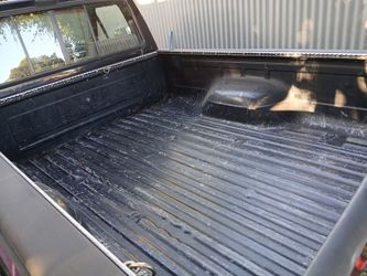 Truck bed track tie down