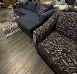 Open box two piece sectional and chair .