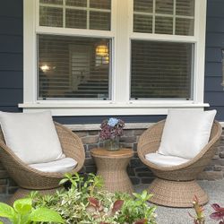 Wicker Outdoor Set With Two Swivel Chairs and a Table