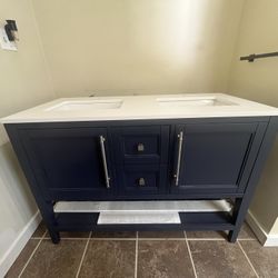 Blue 48 Inch Vanity with double sink and single faucet opening