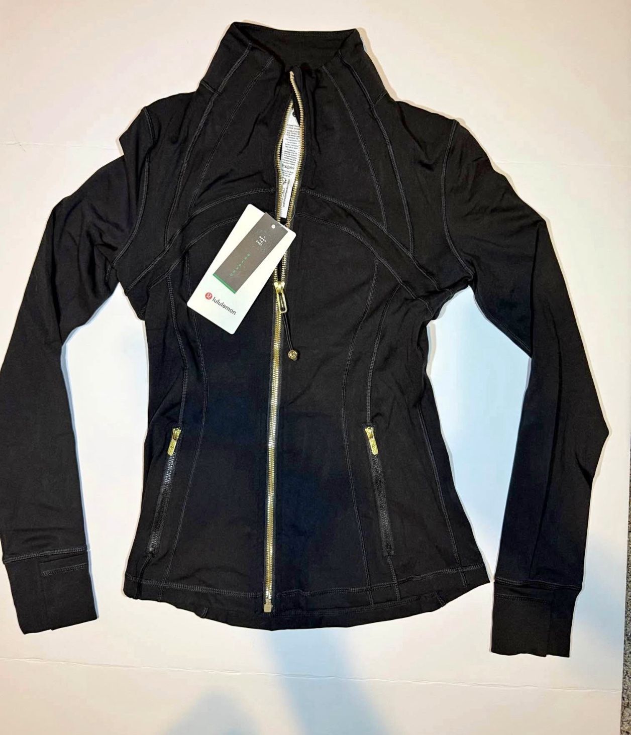Lululemon black Nulu Define Jacket Gold Zipper Woman Size 8 NWT $