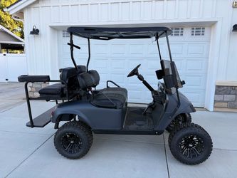 E-Z-GO TXT Electric Golf Cart | Lithium | 6” Lift | 4 Passenger