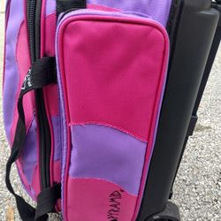 Two Bowling Balls And Rolling Bag