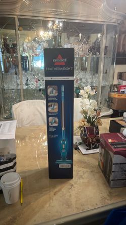 Brand new never opened Bissell featherweight vacuum