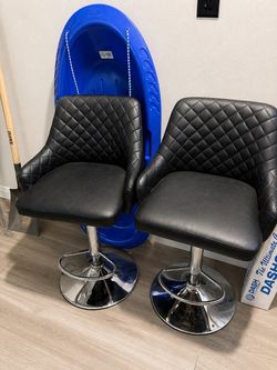 2 black leather/metal bar stools