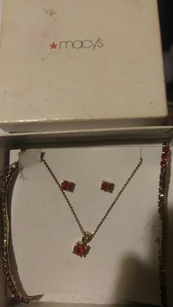 Ruby matching set.earrings. necklace. 2 bracelets