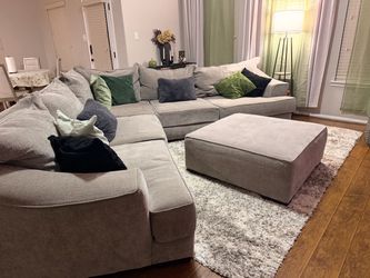 Gray 3-Piece Sectional, Ottoman & Area Rug From Rooms To Go