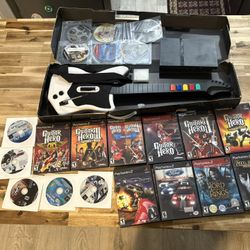 Ps2 (not working) guitar an games!