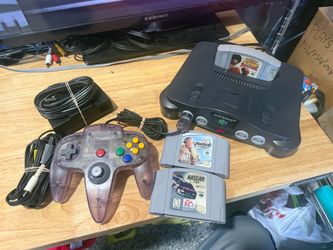 Nintendo 64 N64 Console System Bundle W/Atomic Purple Controller & 3 Games Lot!! The product is a Nintendo 64 N64 Console System Bundle, which includ
