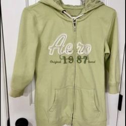 Aero Youth girls Med hooded sweatshirt with ribbed 3/4 sleeves, full zipper&pockets. Good condition.