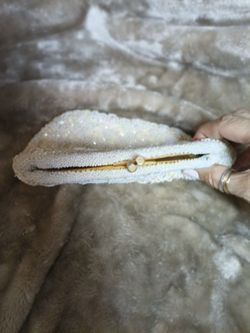 Vintage La Regale Ltd 1950's pearl seeded and sequined bridal clutch with a small interior pocket.