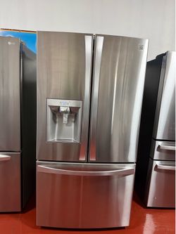 Kenmore 3-door refrigerator with water and ice dispenser, working perfectly. Dimensions: 35 3/4(W) x 30 7/8(D) x 69 (H). Home delivery and installatio
