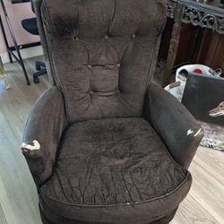 Brown rocker recliner 