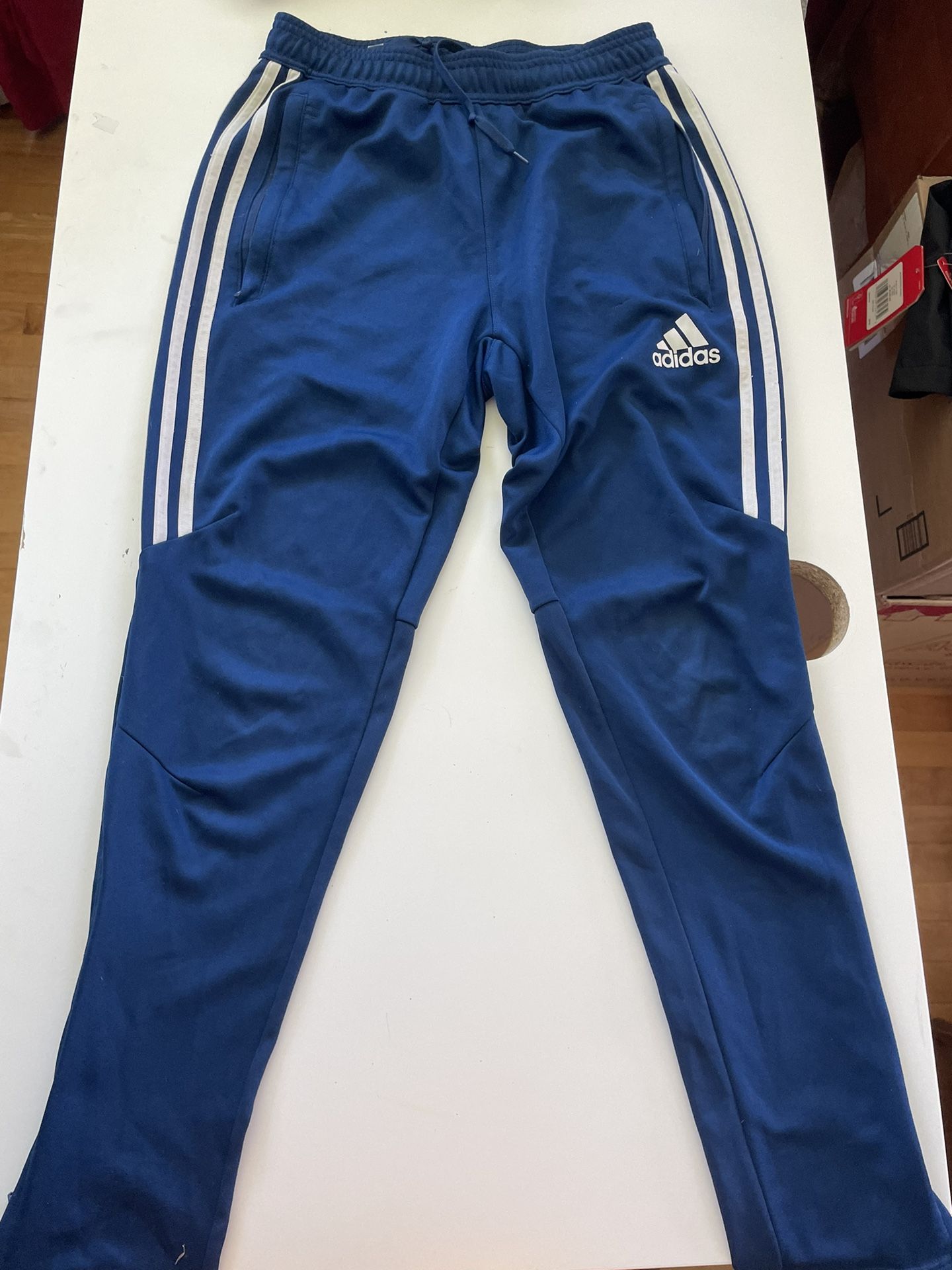Adidas blue joggers with white stripes Size: S 🚚 Ships fast – usually same or next day 🔥 Bundle & save – DM for deals on 2+ items!