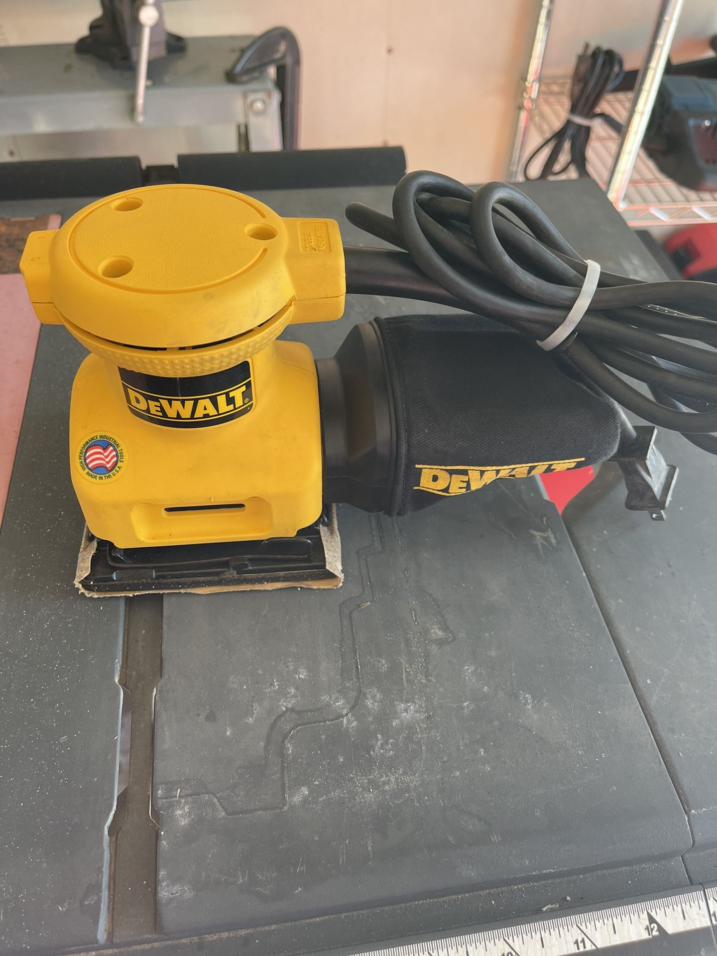 DEWALT DW411 1/4 Sheet Palm Grip Sander in great working condition.
