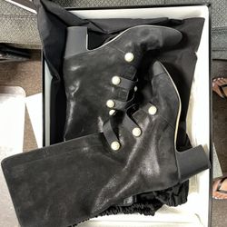 CHANEL Black Heeled Boots with Elegant Design