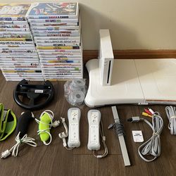 Huge Nintendo Wii Bundle w/ tons of games and accessories