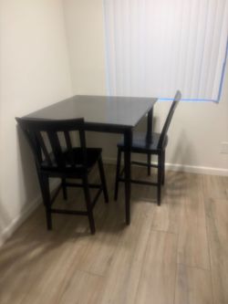 Dining table black 2 chairs need to sell