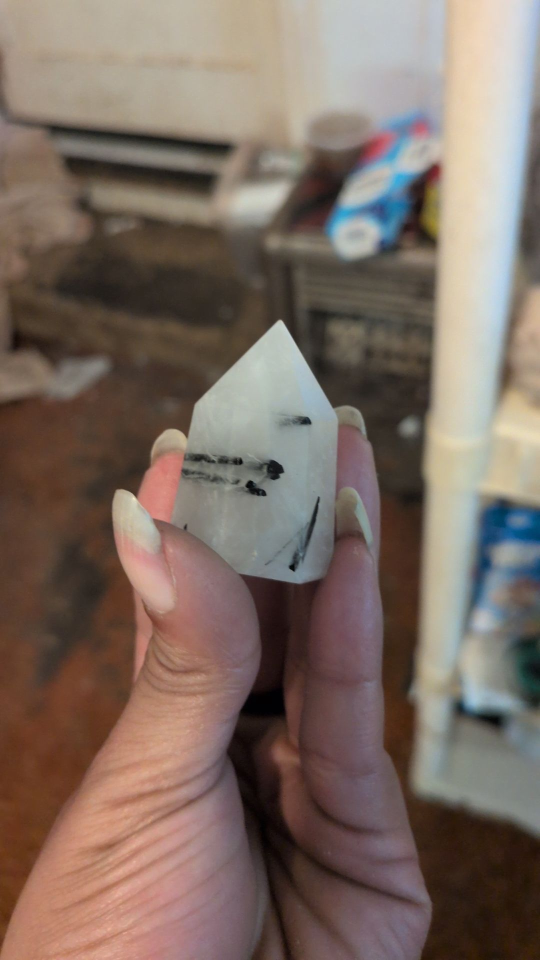 Quartz in tourmaline point
