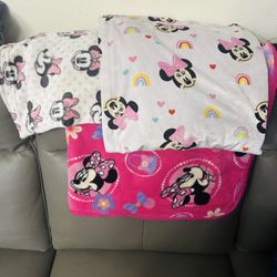 Three Minnie mouse covers