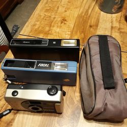 3 cameras with one case Included 