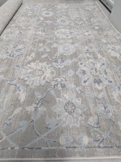 10' 2" x  7' 10" Area Rug