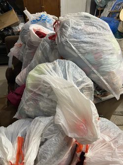 Bags full of baby clothes