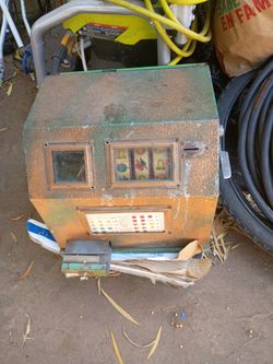 Vintage 1930 gumball slot machine "Works".