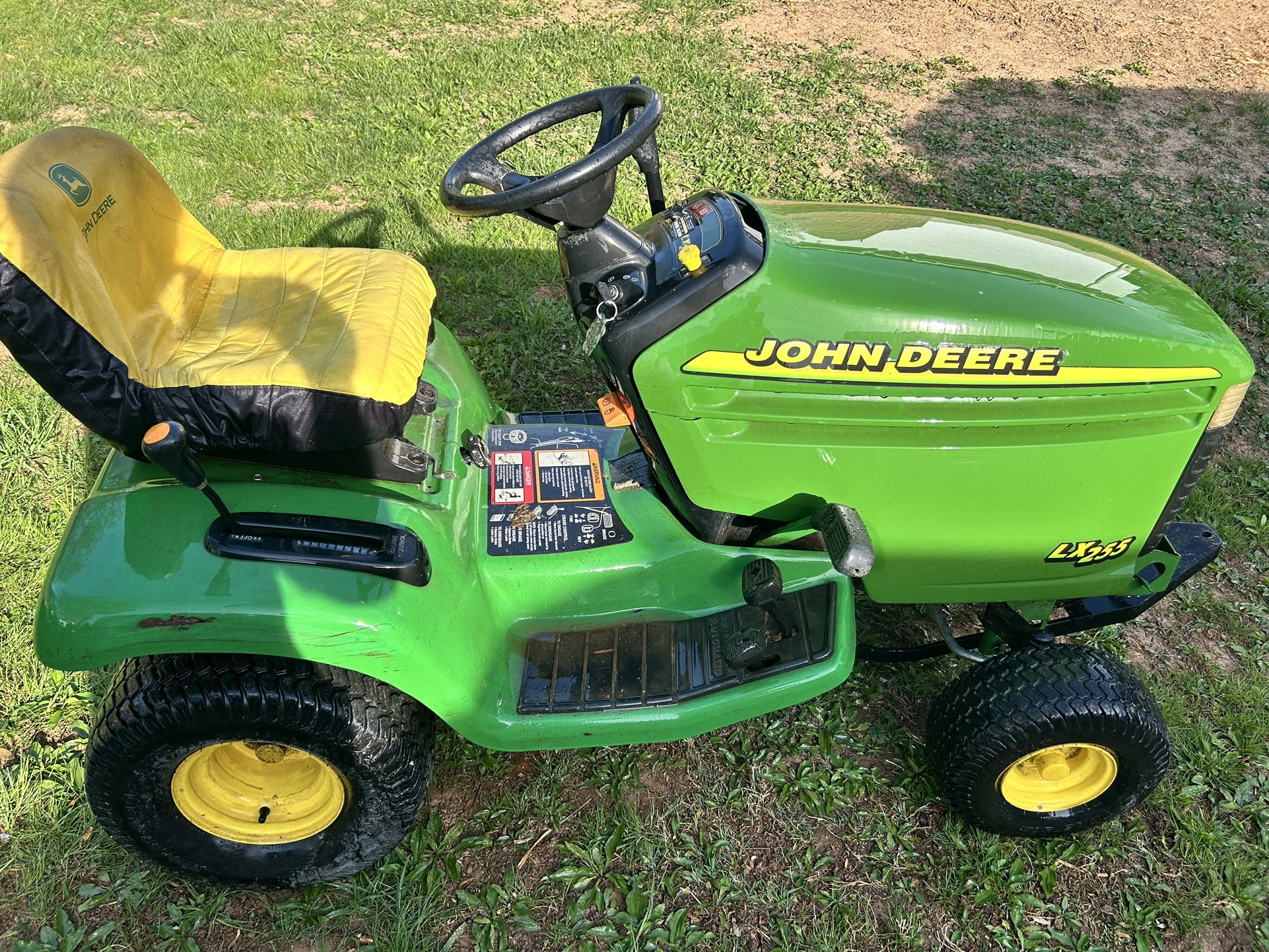 Lx255 Mower With Plow And Bagger.