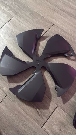 I am selling a set of 4 Tesla OEM 19" Crossflow wheel covers. These will fit the 2026 Model Y with 19" Crossflow wheels.