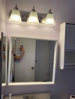 Vanity fixture, mirror and cabinet